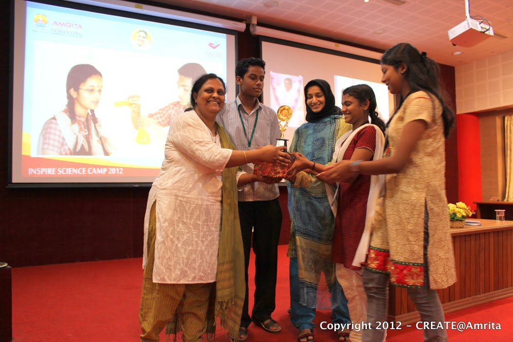 60-Group awards handed out to 1st prize winners in competitions held at various workshops