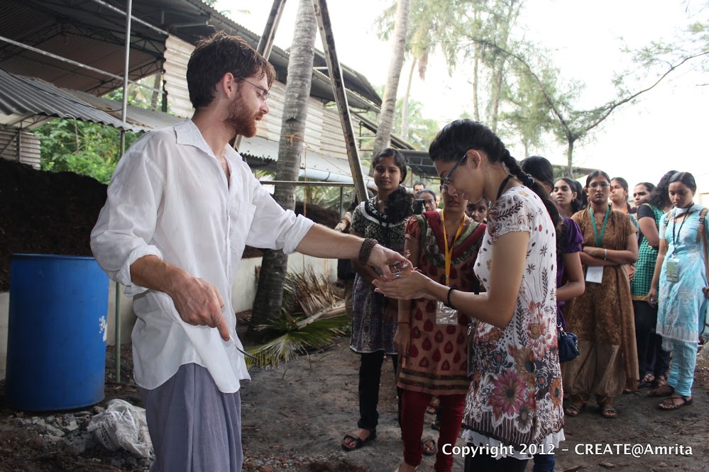 18-A students given a plant sapling to plant at the composting workshop