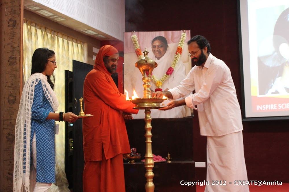 21-Lighting the lamp by Sampoojya Swami Purnamritananda Puri