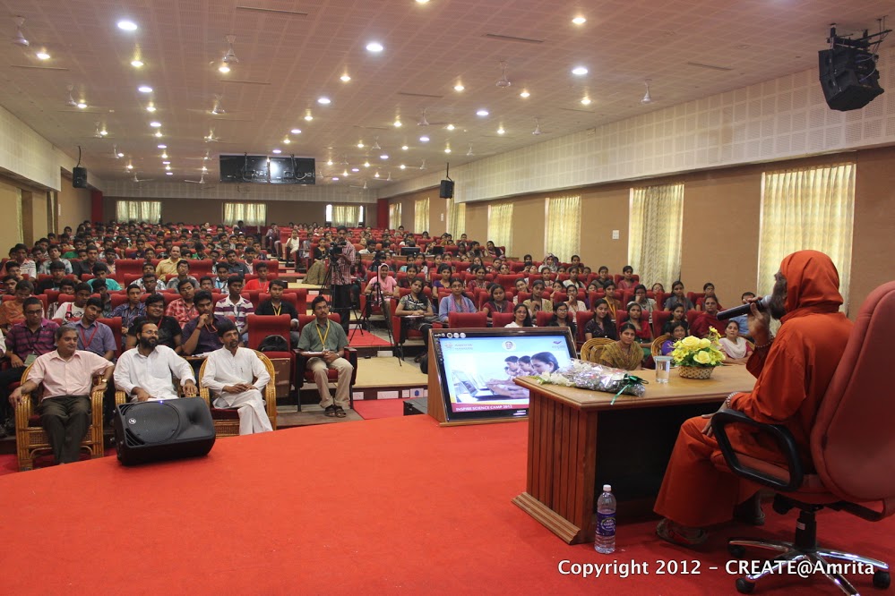 23-Students listening to the talk by Sampoojya Swami Purnamritananda Puri
