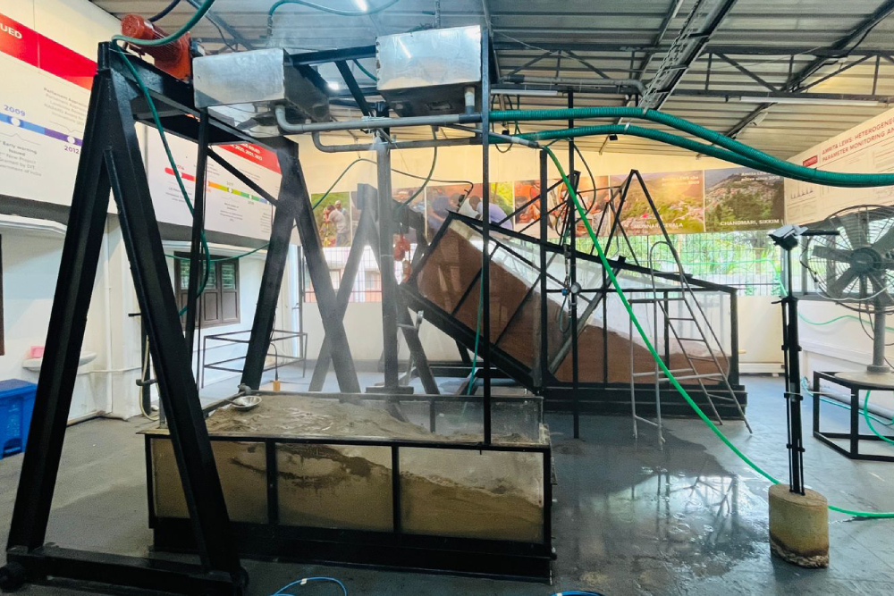 Physical Modelling of Rainfall Induced Landslides Using Laboratory Flume Tests